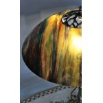 Brass lamp with glass uroboros