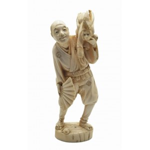 Figurine of a man with a monkey