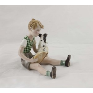 Figura - Chłopiec czytający z psem
