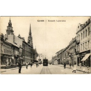 Újvidék, Novi Sad; Kossuth Lajos utca, villamos, Aich Nándor üzlete / street, tram, shops