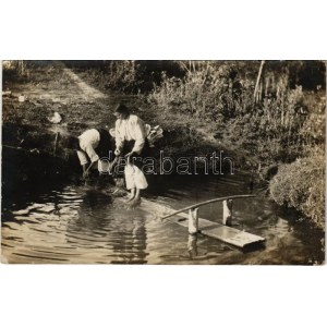 Mosónők a patakban / Washing women in the creek, folklore. photo