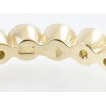 Arany (Au/14k) női körbeköves kanárisárga gyémánt gyűrű, sárga arany, 22 db brillel ékítve (0,75ct/VS) m:53,5, bruttó...