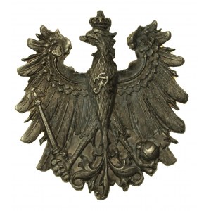 Prusy. Orzeł z monogramem na piersi oraz regaliami (967)