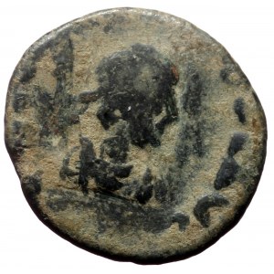 Uncertain. AE. (Bronze, 1.17 g. 12 mm.) 1st-3rd century AD.