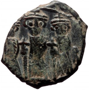 Constans II, Constantine IV, Heraclius, and Tiberius, AE, Follis (Bronze, 5.30 g. 22 mm.) Constantinople. 641-668 AD.