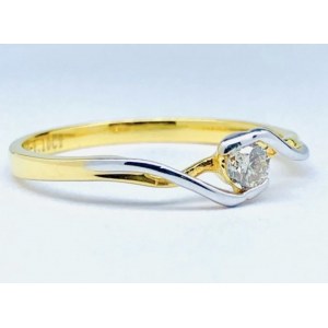 18 karátový zlatý prsteň s diamantom
