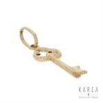 Charm in the form of a key, 20th century.