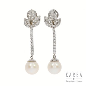Pearl earrings with leaf motif, 20th century.