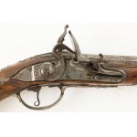 PISTOLET WITH A COCKPLUG, mid-18th century.