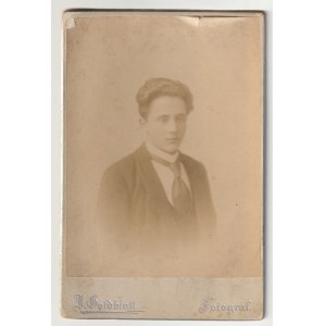 BRZEZANY - Goldblatt. Portrait of a young man, cardboard, late 19th/early 20th century, photo frontispiece, signed J. Goldblatt photographer, on verso an advertisement of the factory fot.