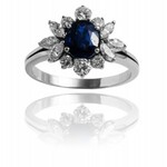 Ring with ~1.00ct sapphire and diamonds made of gold