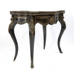 French Boulle gaming table - second half of the 19th century, ebonised wood with bronze applications and brass threading. Height x width x depth: 74 x 90 x 45 cm. Item condition grading: *** fair (missing rear foot).