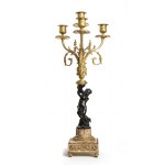 French gilded bronze triptych - Paris 19th century, signed H. JURNET & CIE., A pair of square marble and gilt bronze candelabra resting on spinning top feet, patinated bronze shafts depicting two putti supporting the upper five flames Clock with rectangul