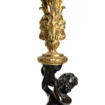 French gilded bronze triptych - Paris 19th century, signed H. JURNET & CIE., A pair of square marble and gilt bronze candelabra resting on spinning top feet, patinated bronze shafts depicting two putti supporting the upper five flames Clock with rectangul