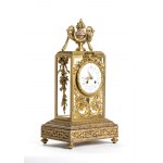 French gilded bronze triptych - Paris 19th century, signed H. JURNET & CIE., A pair of square marble and gilt bronze candelabra resting on spinning top feet, patinated bronze shafts depicting two putti supporting the upper five flames Clock with rectangul