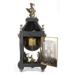 Mantel clock - France, 19th century, A shaped case resting on spinning top feet, adorned with bronze statuettes representing the 'Moire', the personification of ineluctable destiny also called Fatae, i.e. those who preside over fate, placed on the front d