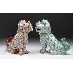 A pair HEREND porcelain Big Fo-Dog - Hunghary, in white porcelain with green and coral red decoration and gilded details. Signed on the base Herend - Hunghary - Handpainted and numbered 176 and 178. Height x width x depth: 25 x 26 x 11 cm. Item conditio