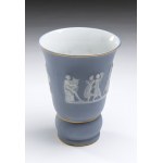 A limoges porcelain vase, Circular base, fluted body in the tones of blue and white finely decorated with classical cameo scenes. Gilded finish. Height 19 cm, upper diameter 14 cm. Item condition grading: **** good.