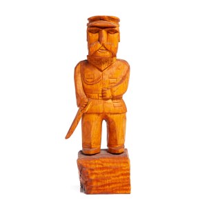 Folk sculpture Marshal Jozef Pilsudski with a saber.