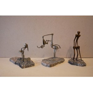 Metal sculptures on a marble base