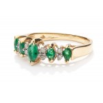 Ring with emeralds and diamonds early 21st century.