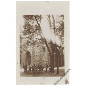[Scouts standing in front of the church].