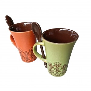 Pair of ceramic mugs with spoon