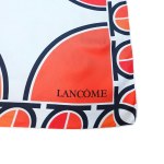 Echarpe en soie orange et blanche LANCOME des années 1970.