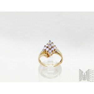 Ring with natural tanzanites and diamonds - 375 gold