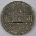 US coins: half dollar 1972 [JFK], quarter dollar 1989 [Washington], one dime 1982 [Roosevelt], five cents 1983 [Jefferson], one cent 1980 [Lincoln].