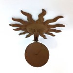 Brass wall candle holder in the form of an astrological sun