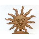 Brass wall candle holder in the form of an astrological sun