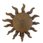 Brass wall candle holder in the form of an astrological sun