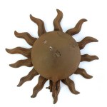 Mosadzný nástenný svietnik v tvare astrologického slnka