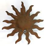 Brass wall candle holder in the form of an astrological sun