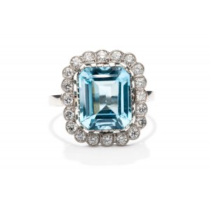 Ring with topaz and diamonds, early 21st century.