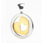 BULGARI: tondo heart gold and steel pendant