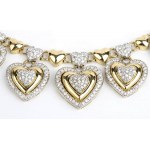 Necklace with a gold and diamond heart motif