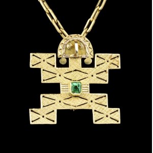 Gold necklace with emerald pendant