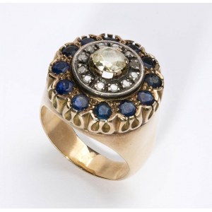 Diamonds and sapphhires gold and silver ring