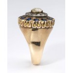 Diamonds and sapphhires gold and silver ring