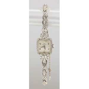 HAMILTON: ladies wristwatch in gold and diamonds - 1940s