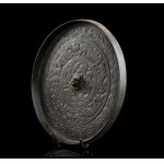 A BRONZE MIRROR Western China, 1st millennium BC (?)