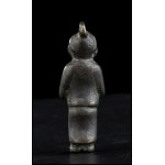 A BRONZE PENDANT WITH A FIGURE China, probably Liao dynasty