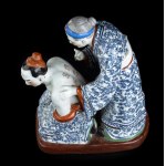 A POLYCHROME ENAMELLED PORCELAIN GROUP WITH YUE FEI AND HIS MOTHER China, 20th century