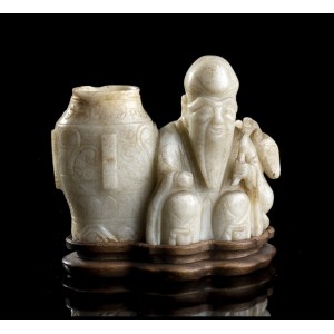 A JADE CARVING OF SHOULAO WITH A JAR China, Ming dynasty