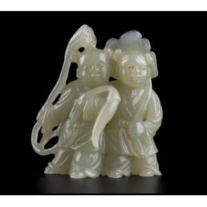 A PALE GREEN JADE CARVING OF TWO CHILDREN China, Qing dynasty, 19th century