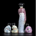 A POLYCHROME ENAMELLED PORCELAIN FEMALE FIGURE AND THREE CHILDREN China, 20th century