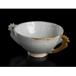 A WHITE GLAZED AND GOLD-RESTORED PORCELAIN HANDLED BOWL Korea, Joseon dynasty, late 15th century