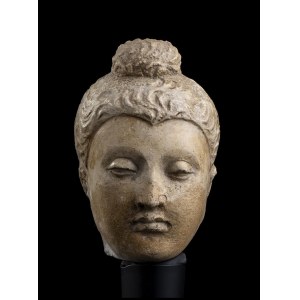 A STUCCO BUDDHA HEAD Gandhara style